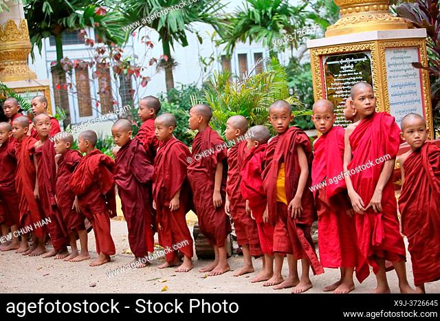 Novice monks in the Shwe Yaunghwe Kyaung Monastery, near Nyaungshwe, Shan State, Myanmar