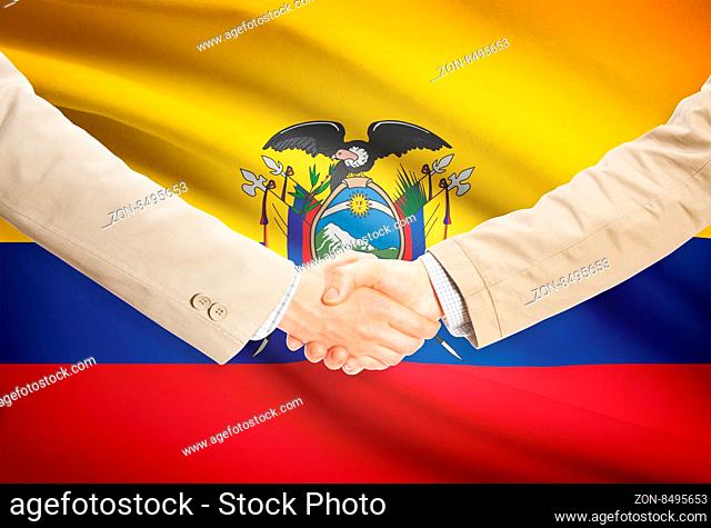Businessmen shaking hands with flag on background - Ecuador