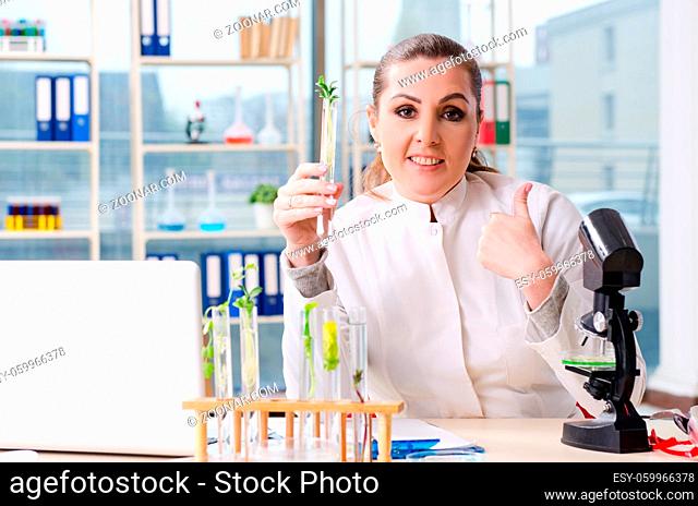 Female biotechnology scientist chemist working in the lab