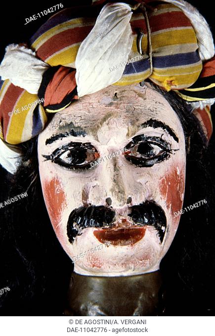 Face of a puppet from the Opera dei Pupi (Opera of the Puppets), Acireale handicrafts, Sicily, Italy. Detail