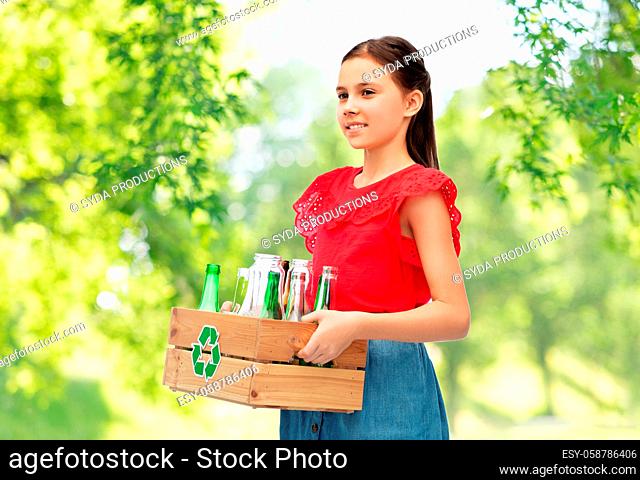 smiling girl with wooden box sorting glass waste