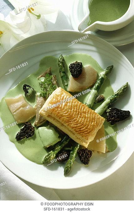 Calf's head with puff pastry, asparagus, morels & chervil sauce