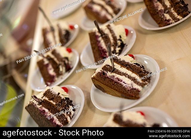 16 April 2023, Baden-Württemberg, Todtnauberg: Individual pieces of Black Forest cake lie on plates. At the festival, the best Black Forest gateau is to be...