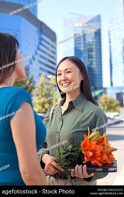 Mature Business Woman With Flowers