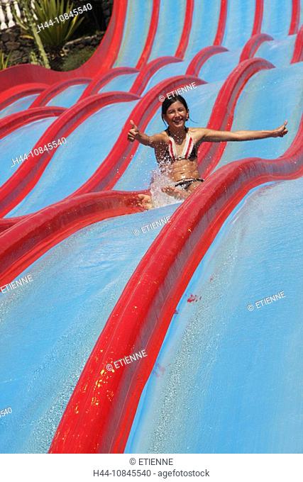 Lanzarote island, Spain, Europe, Canary islands, Costa Teguise, Aquapark, water park, water slide, sliding, girl, Outd