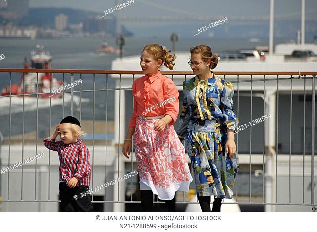 Children on board the aircraft carrier Intrepid.  Pier 83. Hudson River,  West Manhattan, New York, New York. USA