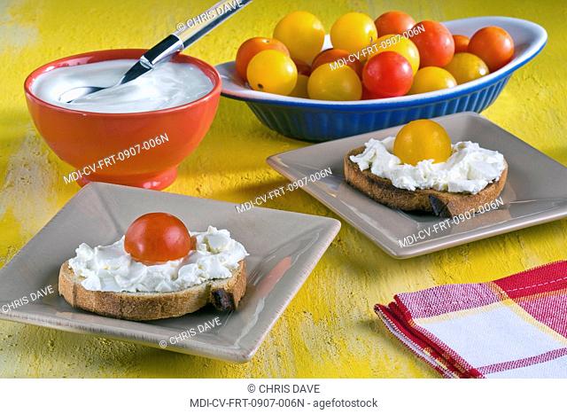 Open face sandwich with Saint-Morêt cheese and cherry tomatoes