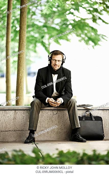 Man listening to music on coffee break