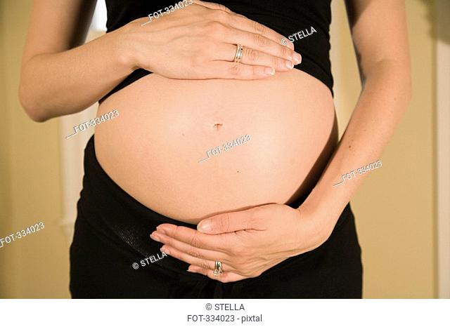 Midsection view of a pregnant woman