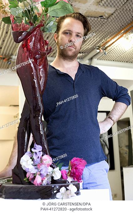 Australian artist Joseph Marr poses in his atelier in Berlin-Neukoelln, Germany, 22 July 2013. Marr creates sculptures made of candy