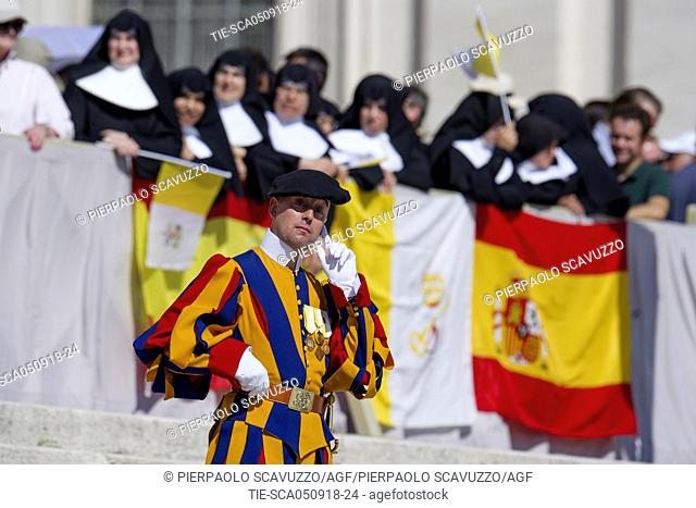 Swiss Guard and nuns during the General Papal audience, St. Peter Square, Vatican City, ITALY-05-09-2018  Journalistic use only