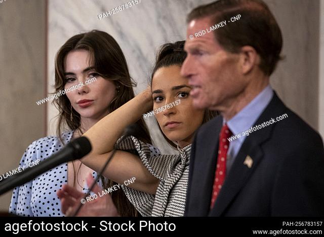 Former U.S. Olympic gymnast McKayla Maroney, left, and former U.S. Olympic gymnast Aly Raisman, center, listen as United States Senator Richard Blumenthal...