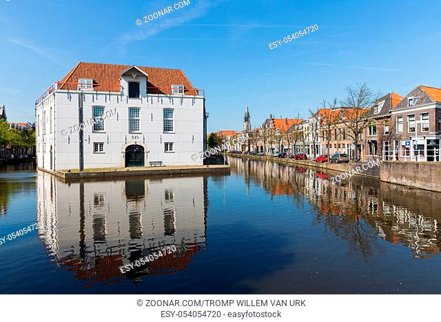 Cityscape of Delft with historic houses and army museum, the Netherlands