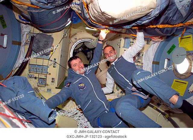 Two Soyuz Taxi crewmembers, Flight Engineer Roberto Vittori (left) of the European Space Agency (ESA) and South African space flight participant Mark...