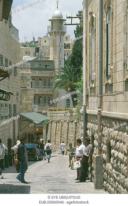 Via Dolorosa narrow street lined with shops. Aka The Way of Suffering. Said to be the route that Jesus carried his cross to the crucifixtion site
