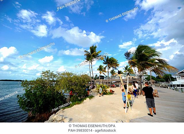Tourists relax at a beach esplanade at Florida Keys in Islamorada, Florida, USA, 26 May 2013.Photo: Thomas Eisenhuth | usage worldwide