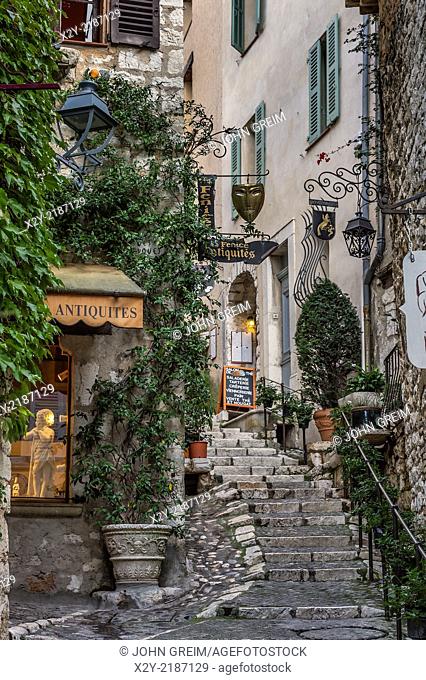Rustic stone steps and shops in the medieval village of St Paul de Vance, Provence, France