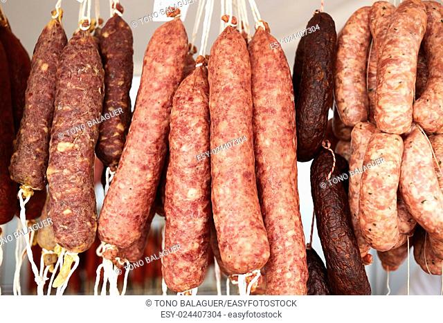 Mediterranean sausages in spain hanging in rows