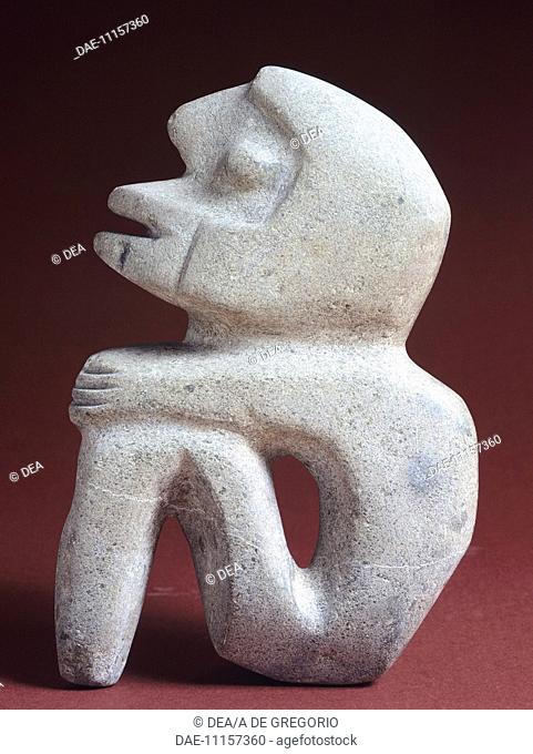 Stone anthropomorphic figurine artifact originating from the Temple Mayor of Tenochtitlan (Mexico). Aztec Civilization 15th Century