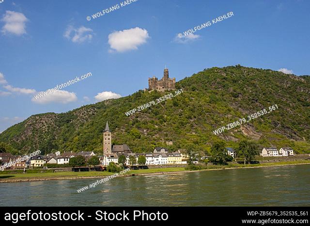 View of the town of Wellmich and the castle Maus above the Rhine River in Germany