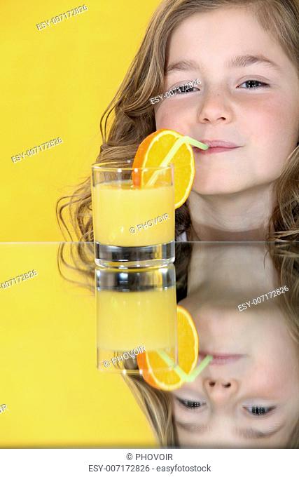 Girl drinking juice