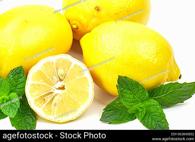 lemon with mint leaves isolated on white background