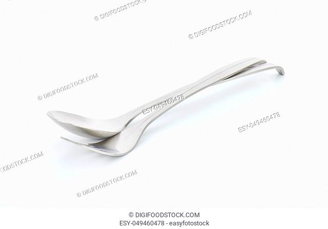 Metal spoon and three-pronged fork
