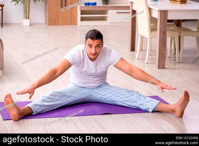 Man starting day with morning exercises