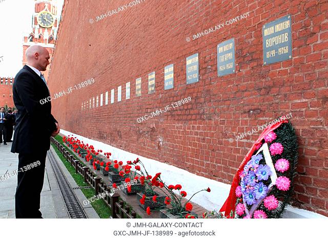 At the Kremlin Wall in Moscow's Red Square, Expedition 4041 Flight Engineer Alexander Gerst of the European Space Agency pauses to reflect May 8 after laying...