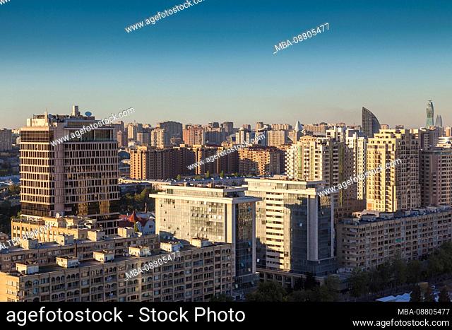 Azerbaijan, Baku, high angle skyline of central Baku, dusk
