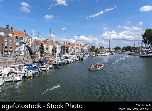 Tour boat and marina at the Rotterdamsekaai, Middelburg, Zeeland, Netherlands, Europe