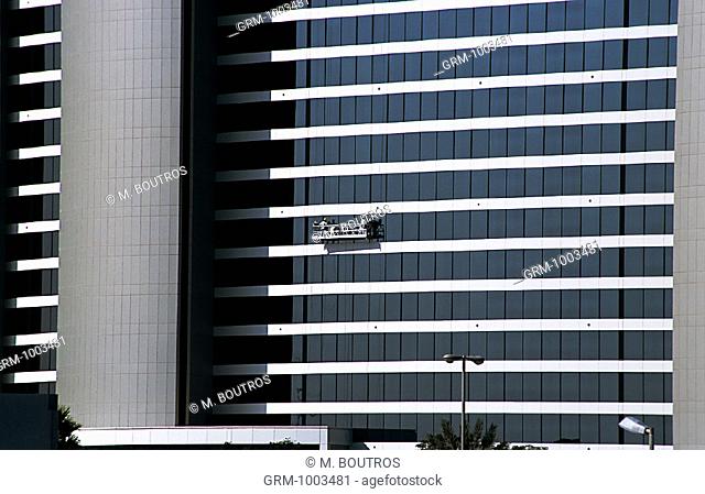 Workers cleaning the windows of Jumeira Beach Hotel in Dubai, United Arab Emirates