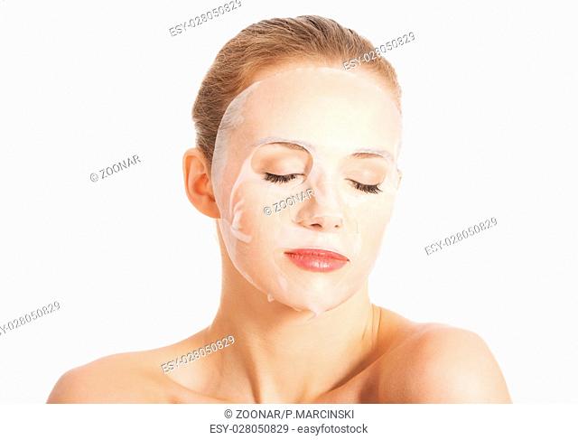 Beautiful woman with collagen mask on face