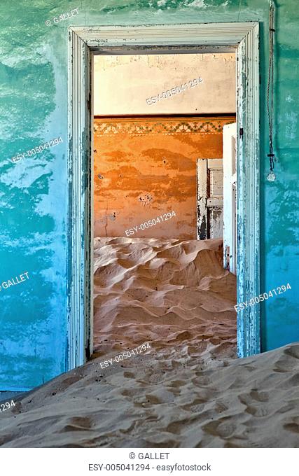 dune in a house at kolmanskop ghost town near luderitz namibia africa