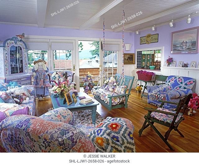 LIVING ROOMS - Lilac walls, white trim, bright and cheery, lots of fabric mix, cottage style, wood porch swing, over stuffed chairs and sofa, wood floor