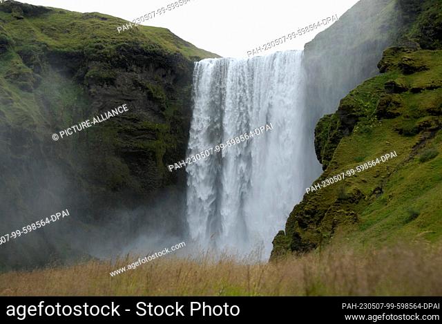 13 August 2022, Iceland, Skógar: Skógafoss is in the south of Iceland. The waterfall is a popular tourist attraction on the ring road