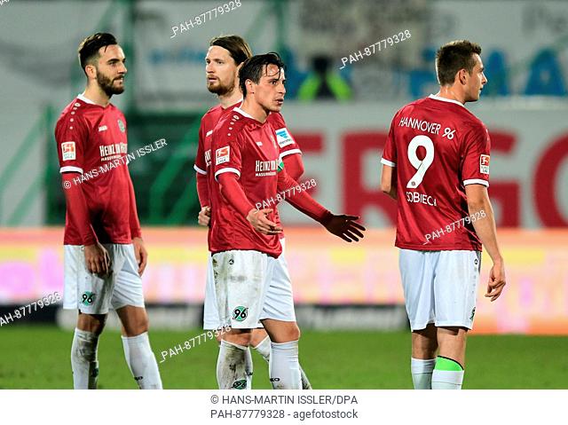 Hanover's Kenan Karaman (l-r), Stefan Strandberg, Edgar Prib and Artur Sobiech react to their defeat after the 2nd Bundesliga soccer match between SpVgg...