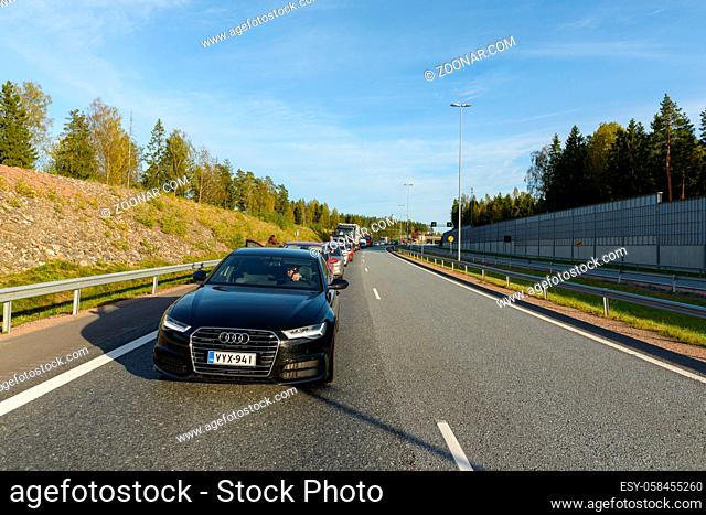 HELSINKI, FINLAND SEPTEMBER 12, 2016 - Cars waiting in traffic at Finnish national road 1 between Helsinki and Turku