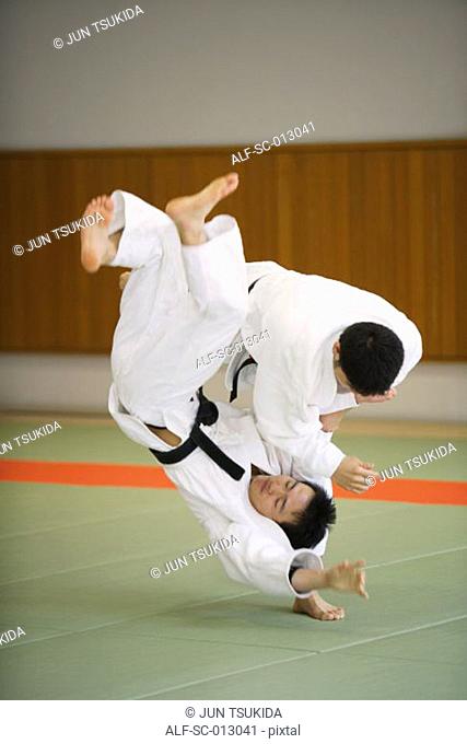 Two Men Competing in a Judo Match