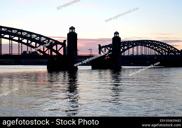 Neva river and Bridge Peter the Great before sunrise in St.Petersburg, Russia
