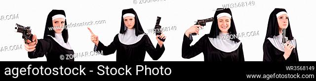 Aiming young nun with gun isolated on white