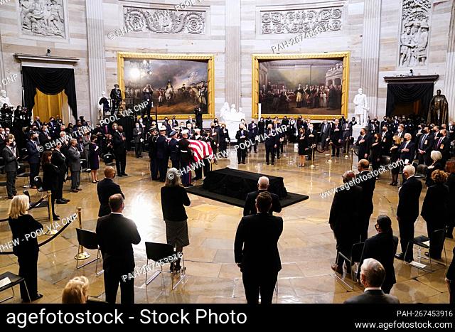 The casket of former Republican Senator from Kansas Robert J. Dole arrives during a ceremony preceding the lying in state in the Rotunda of the US Capitol in...
