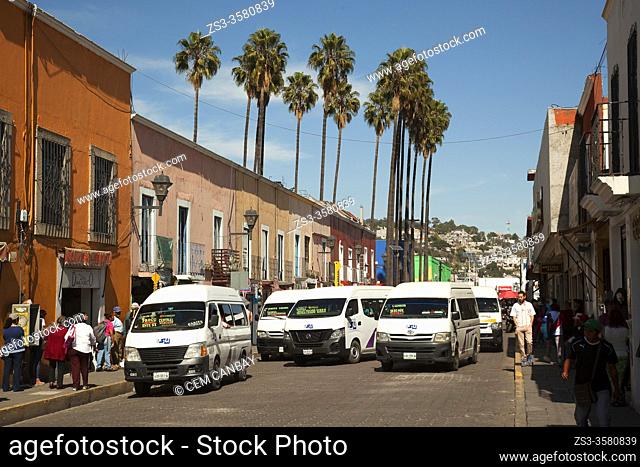 Street scene with colectivos-shared taxis in the city center of Tlaxcala, Tlaxcala State, Mexico, Central America