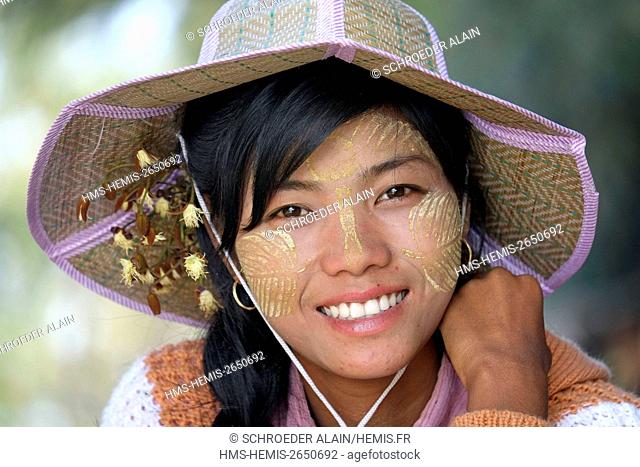 Myanmar, Mandalay, Mandalay Province, girl with thanaka on her face