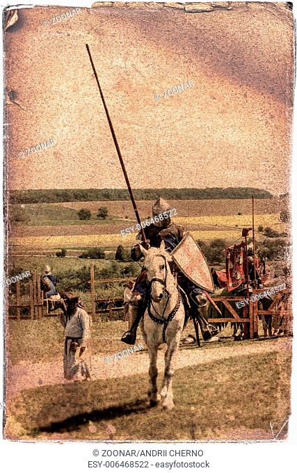 Armored knight on warhorse - retro postcard on vin