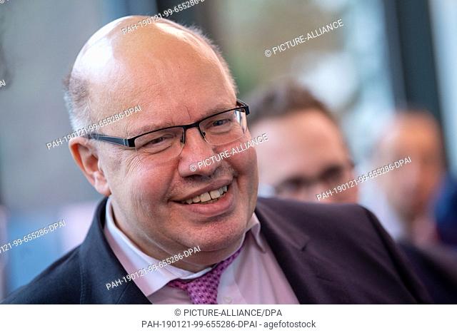21 January 2019, Bavaria, München: Peter Altmaier, Federal Minister of Economics and Energy, talks to participants at the Digital Life Design (DLD) innovation...