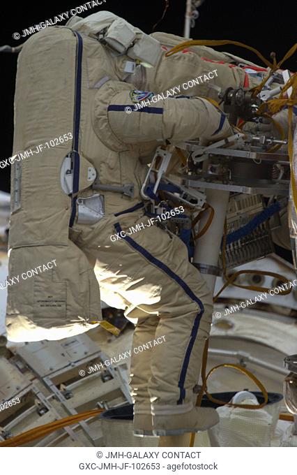 Russian cosmonaut Alexander Misurkin, Expedition 36 flight engineer, participates in a session of extravehicular activity (EVA) as work continues on the...