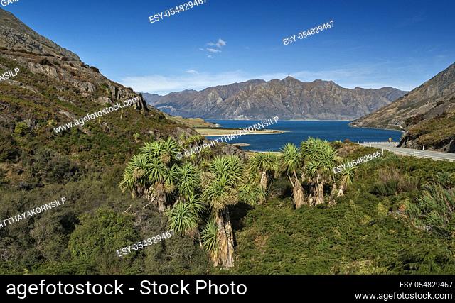 Viewpoint at a rocky ridge called The Neck stands between Lake Wanaka and Lake Hawea at their closest point on the Makarora Lake Hawea road, New Zealand