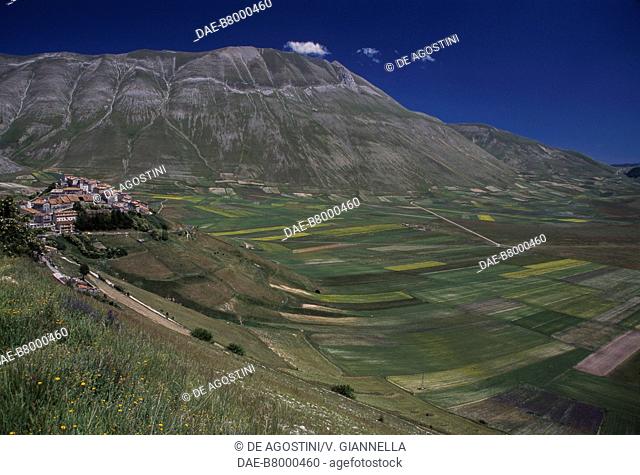 View of Pian Grande, the Cima del Redentore (2448 m), and Castelluccio di Norcia, Monti Sibillini National Park, Umbria, Italy