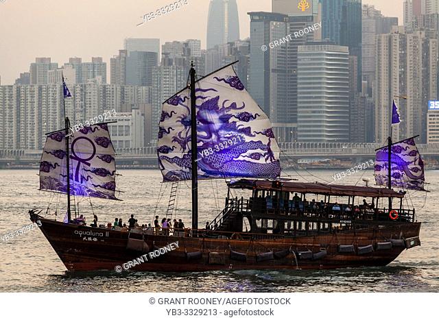 An Aqua Luna Junk Boat Cruise In Victoria Harbour and Hong Kong Skyline, Hong Kong, China